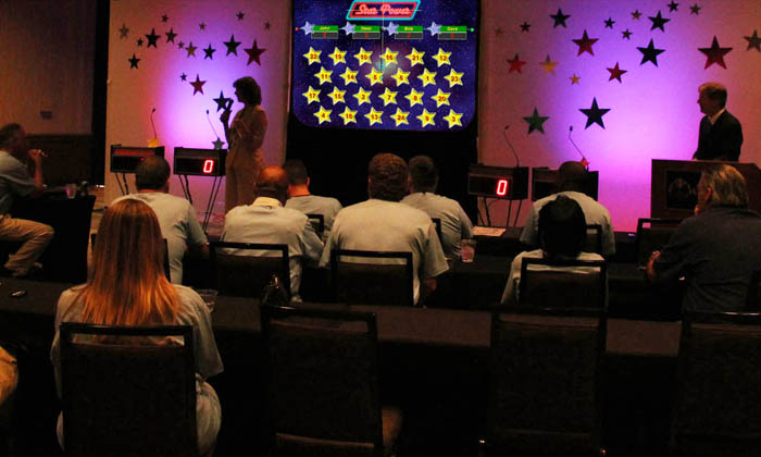 Star Power with up-light backdrop at company event